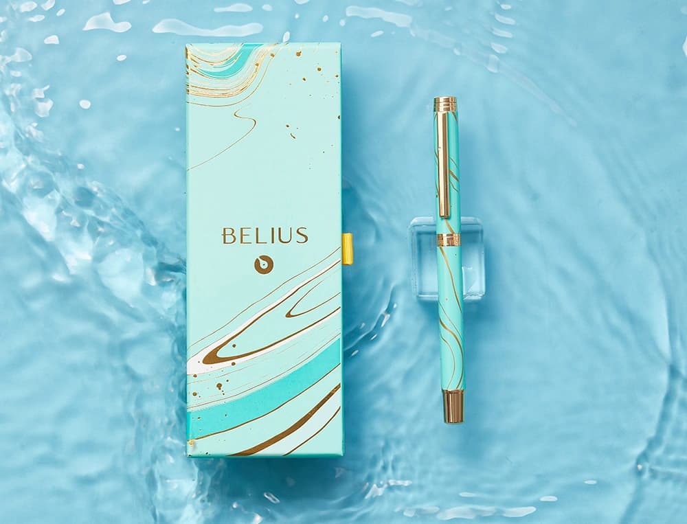 Roller belius aqua aluminio color turquesa y dorado tinta negra caja de diseño